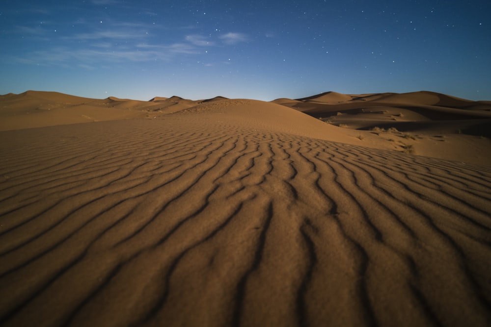 a desert landscape with sand