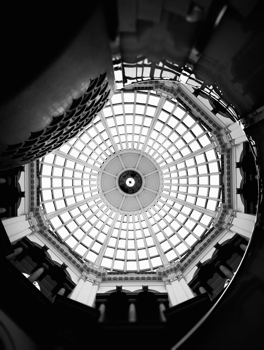 a large circular ceiling with a circular window