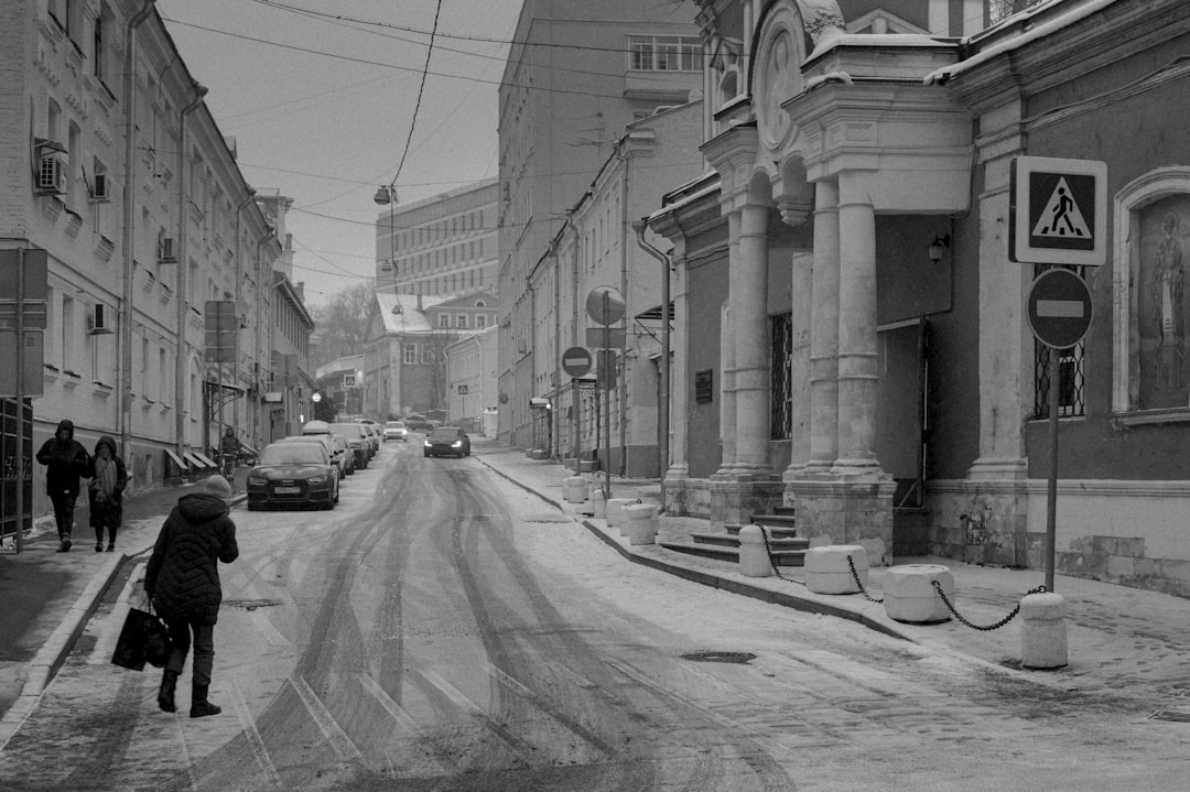 a street with cars and people, The Streets of Winter Moscow