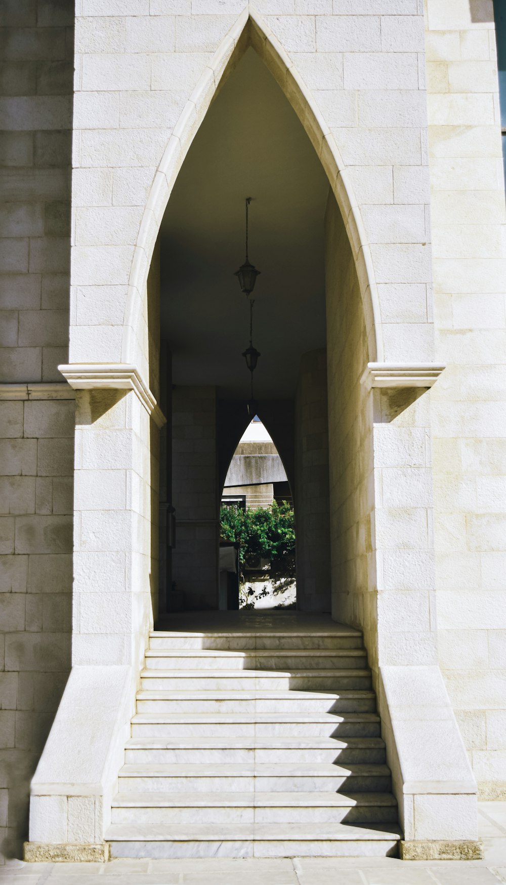 a stone staircase leading to a door