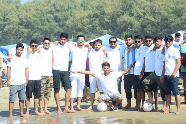 a group of men posing for a photo