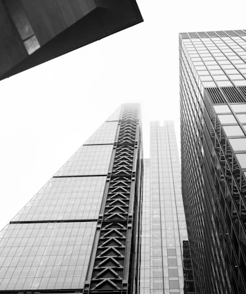 Abstract minimalist cityscape blending global landmarks with clean lines and neutral tones.