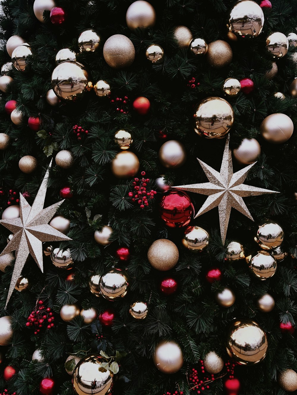 a tree decorated with ornaments and lights