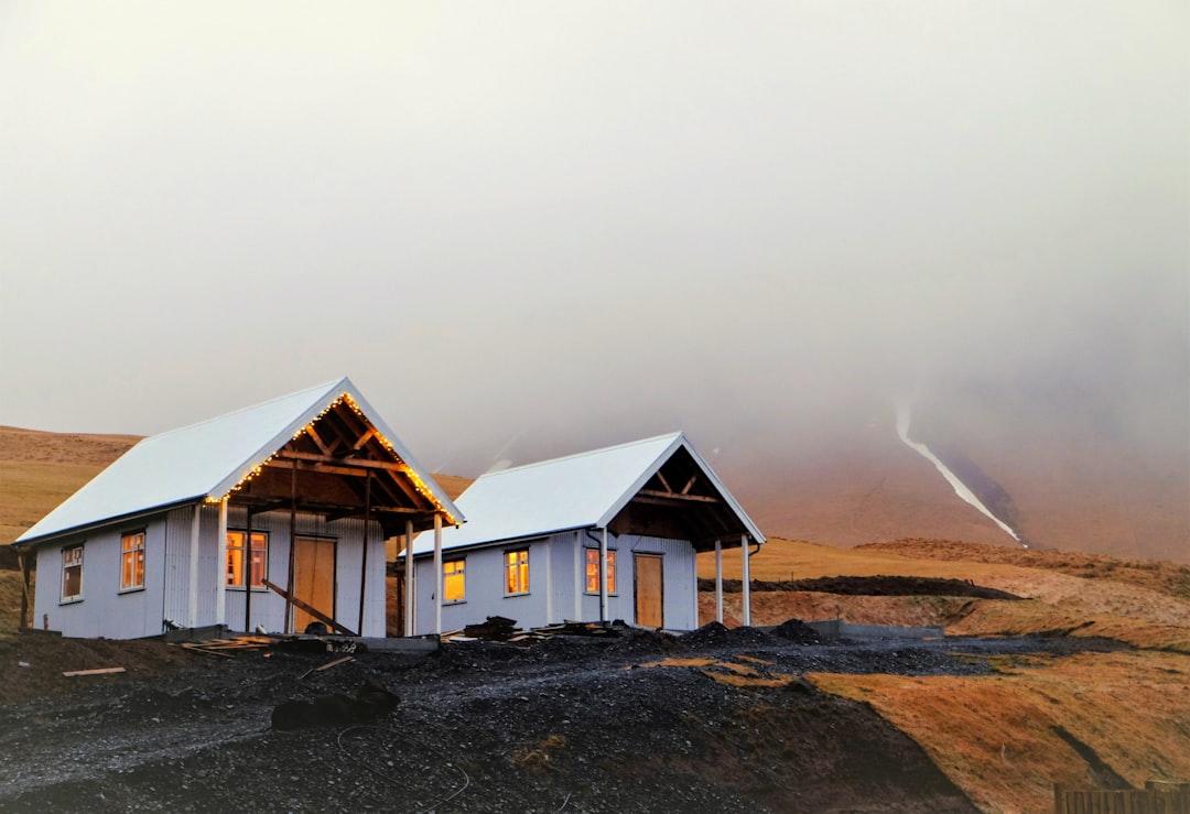 a couple of houses on a beach, Winter in Iceland.