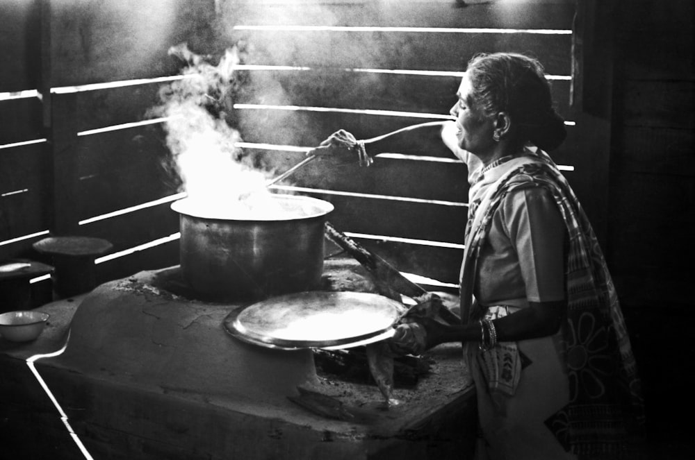 a person cooking in a kitchen