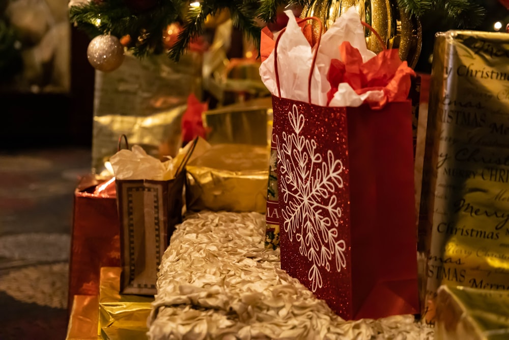 a christmas tree with presents underneath