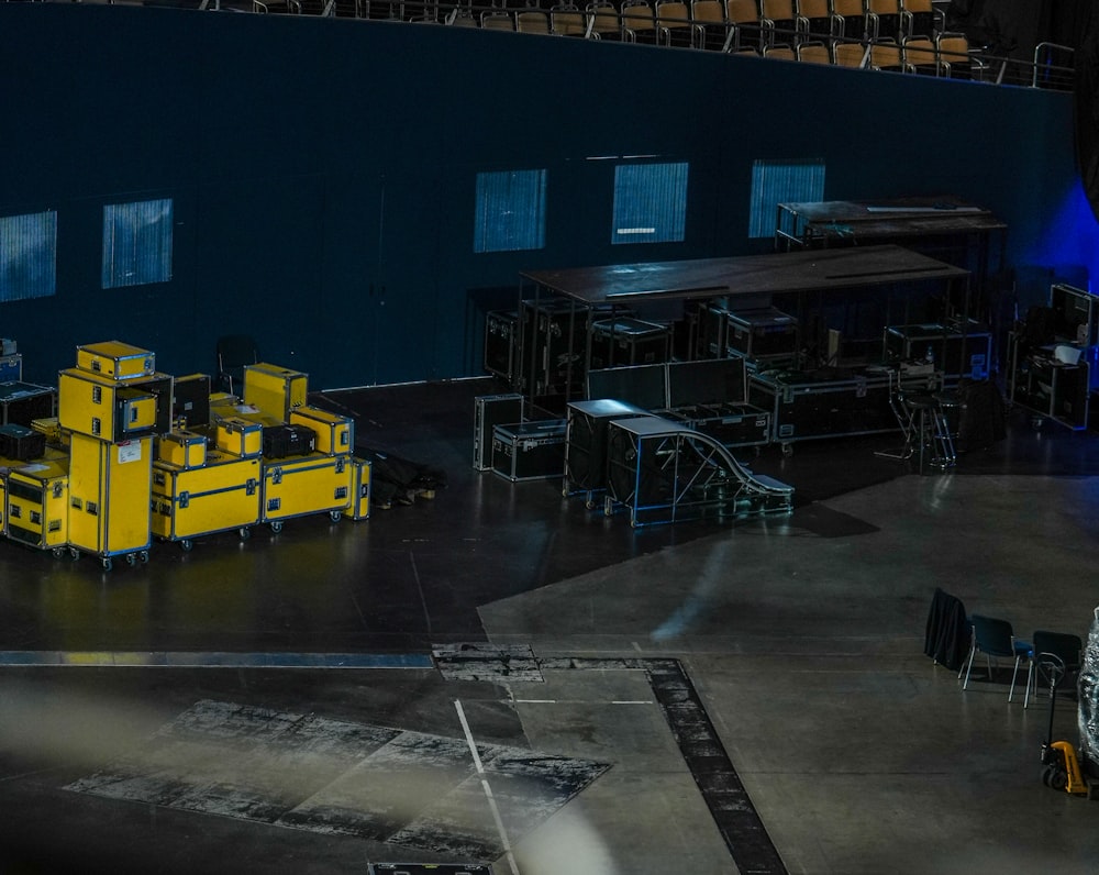 a large room with yellow machines