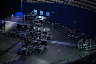 a large room with a few event supplies representing event management by leading company