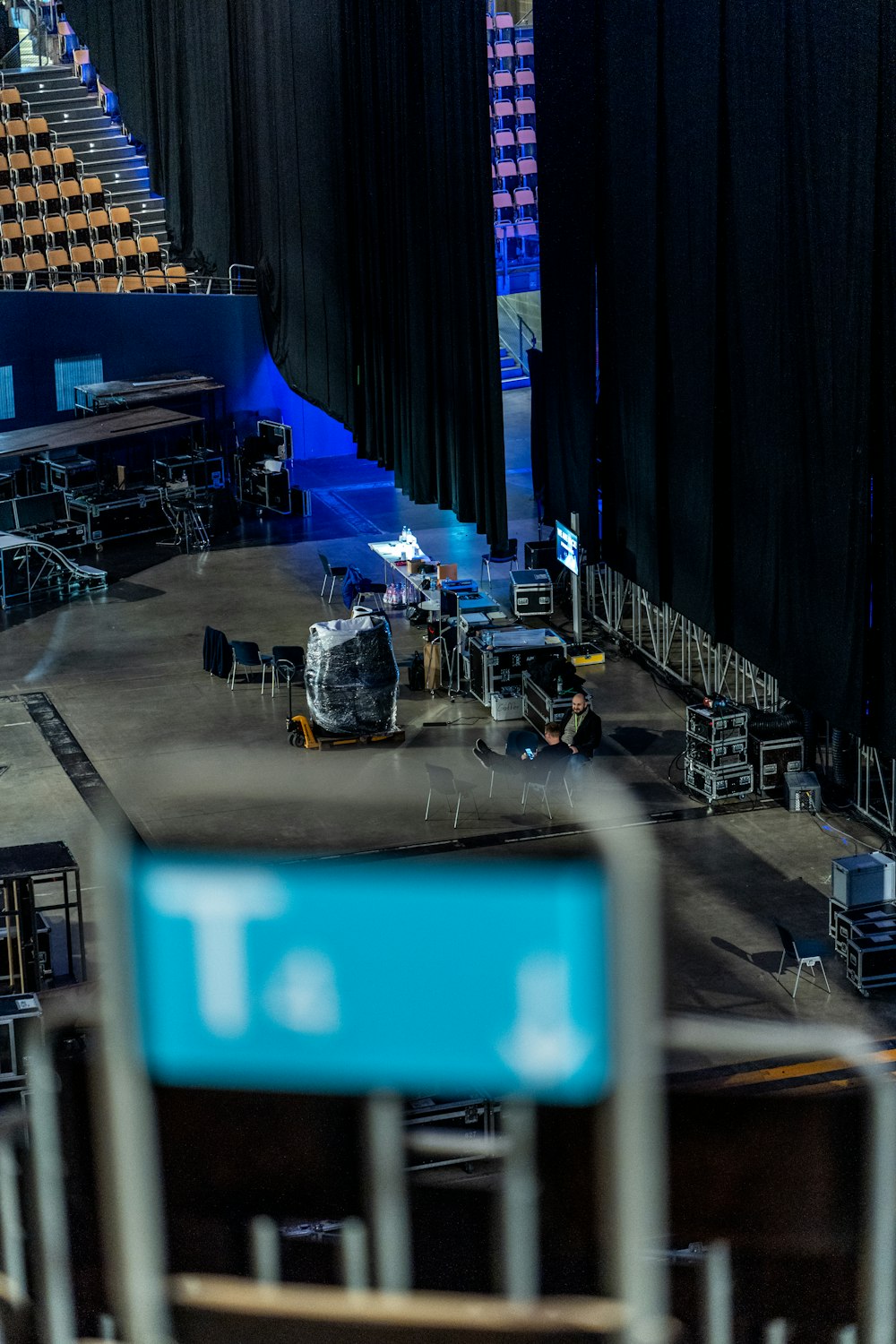 a stage with a screen and a stage with lights