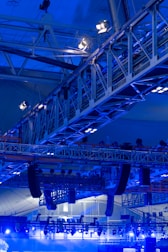 a large blue and white structure with people on it