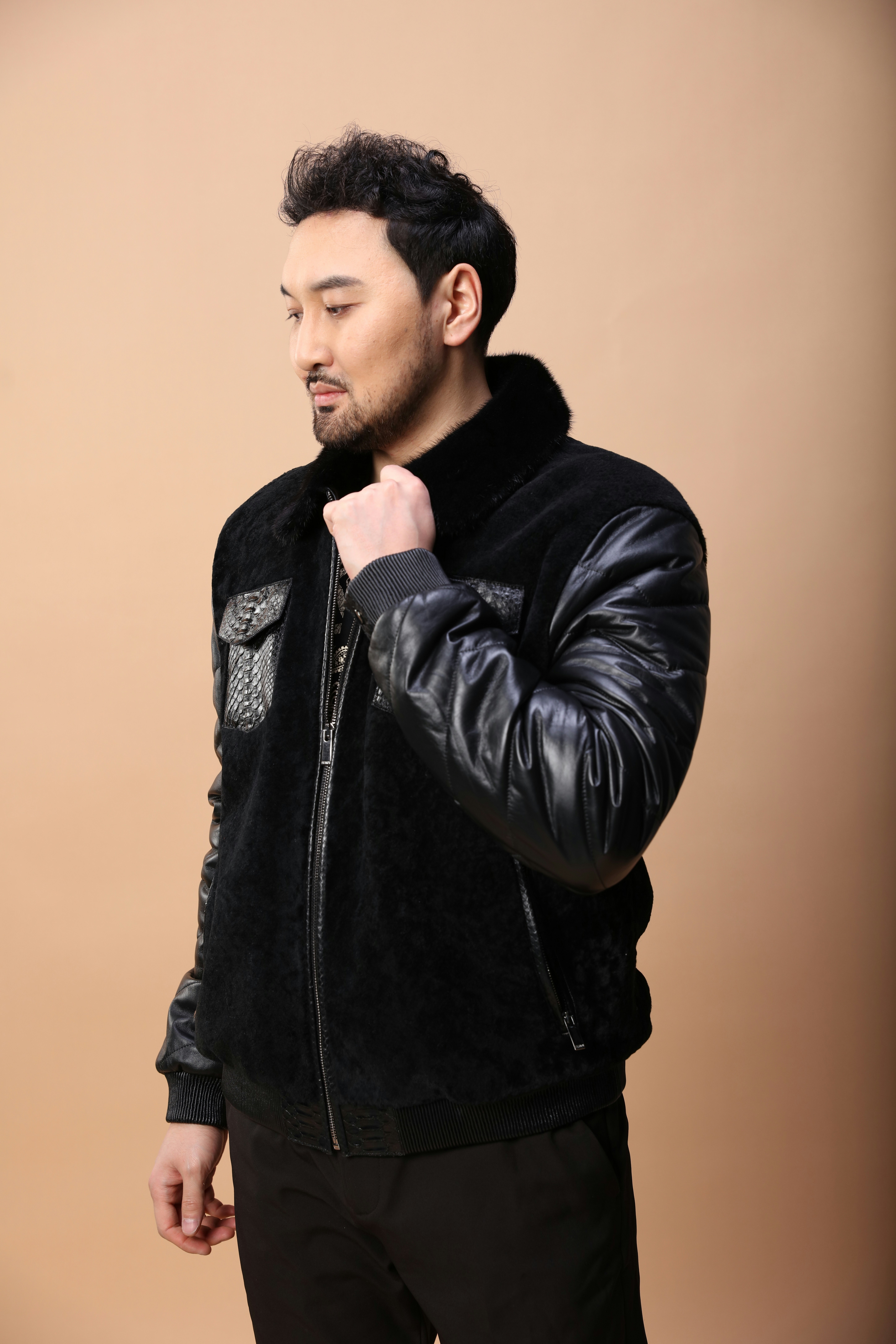 A person wearing a leather jacket photo – Free Coat Image on Unsplash