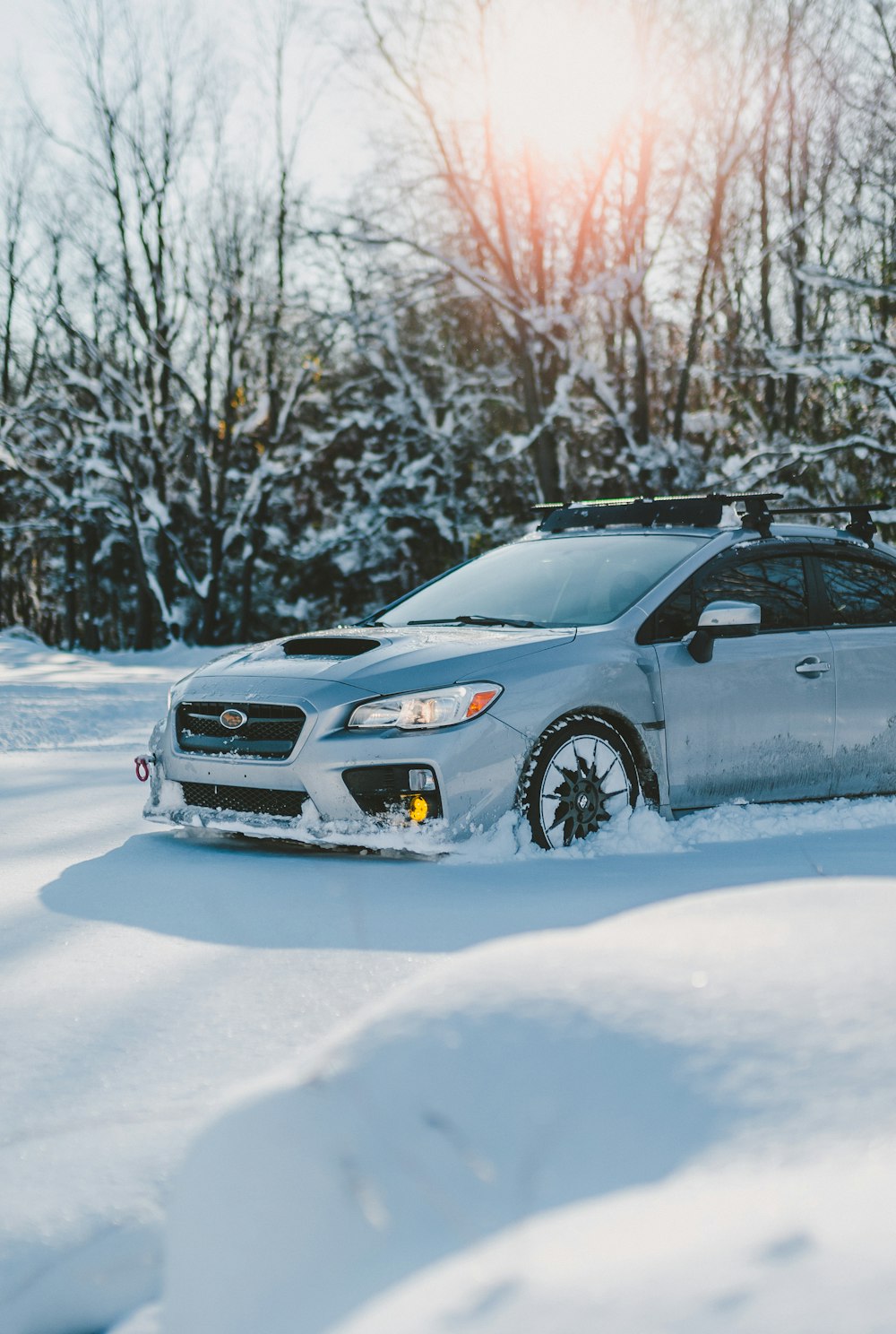 a car parked in the snow