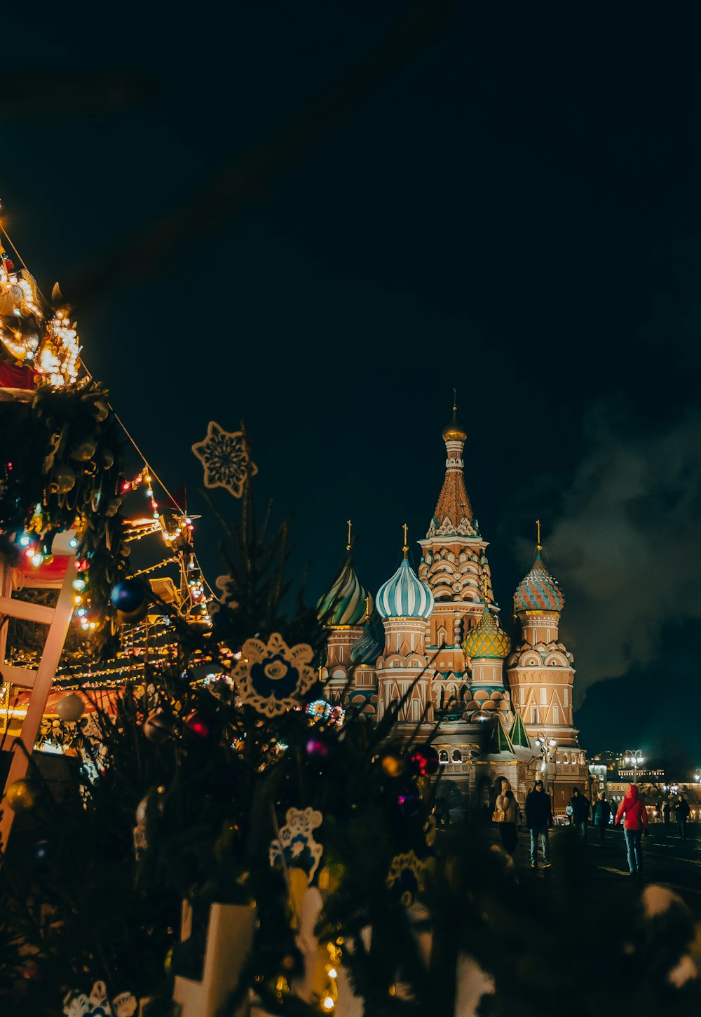 a castle lit up at night