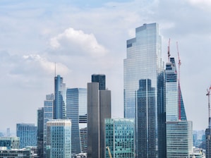 A city skyline showcasing various real estate developments.