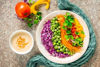 A vibrant salad bowl filled with fresh greens and colorful vegetables.