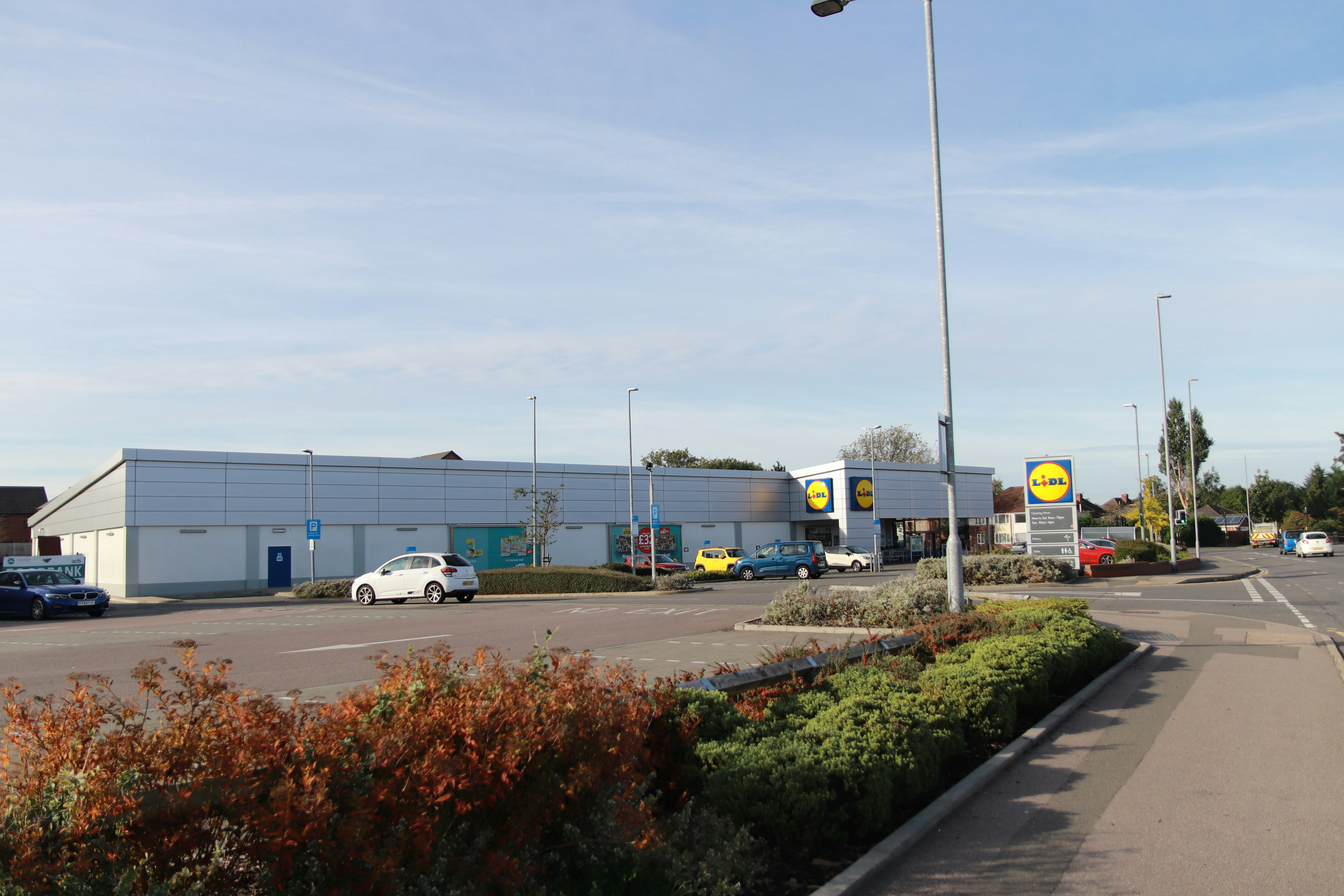 a parking lot with cars