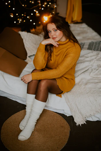 a woman sitting on a couch