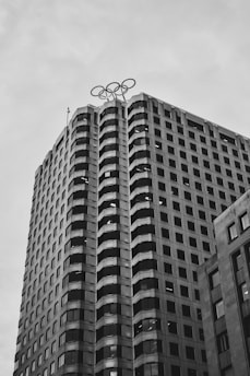Photograph of a modern office building symbolizing international business collaboration.
