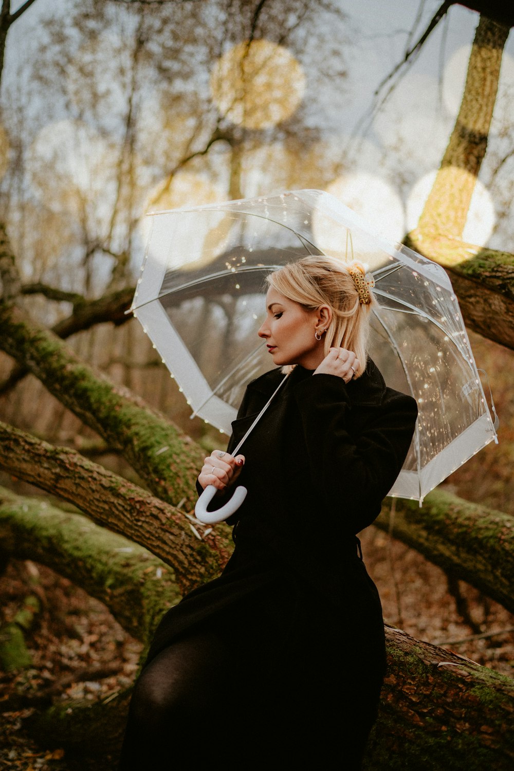 a woman holding an umbrella