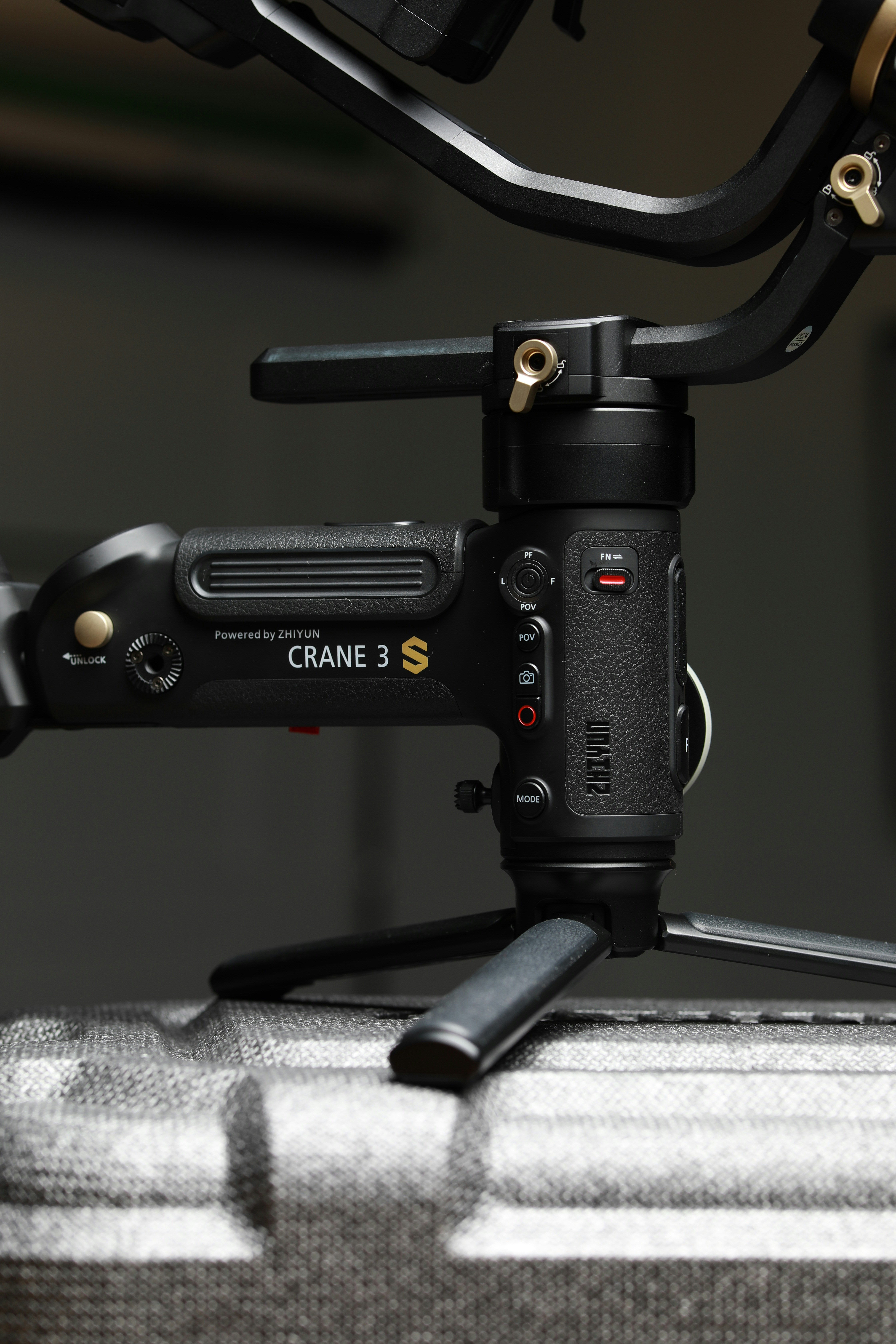 a black camera with a black strap