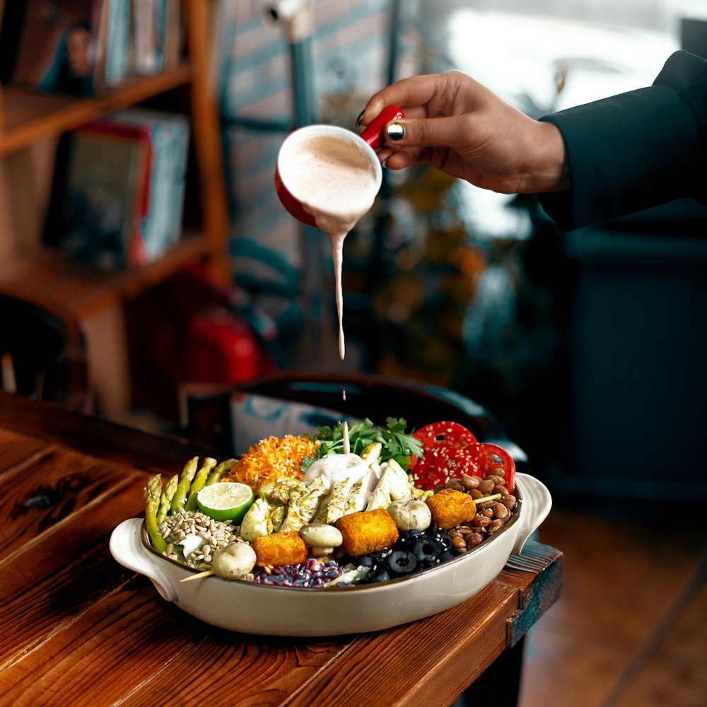 a bowl of food with a spoon