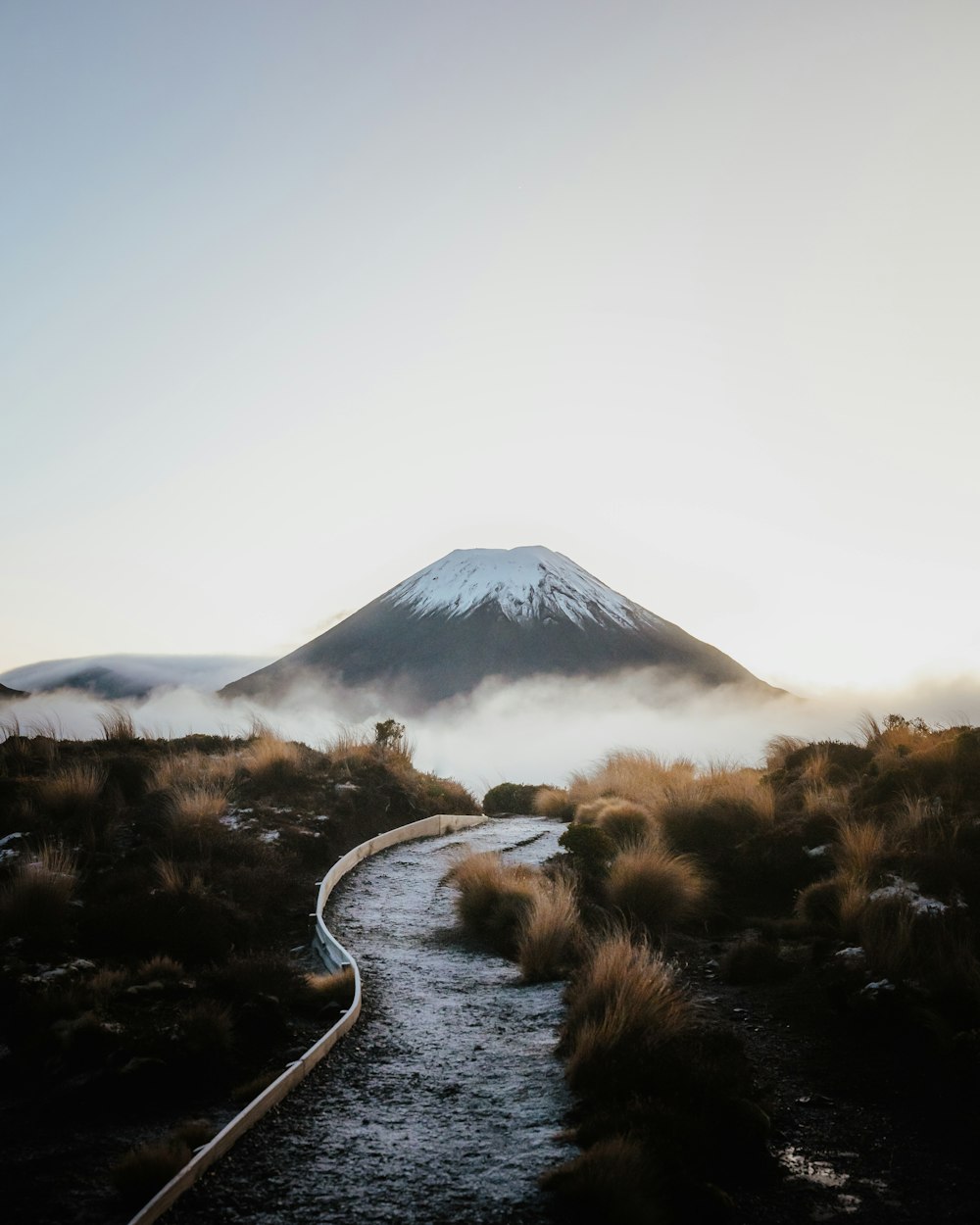 a river with a mountain in the background