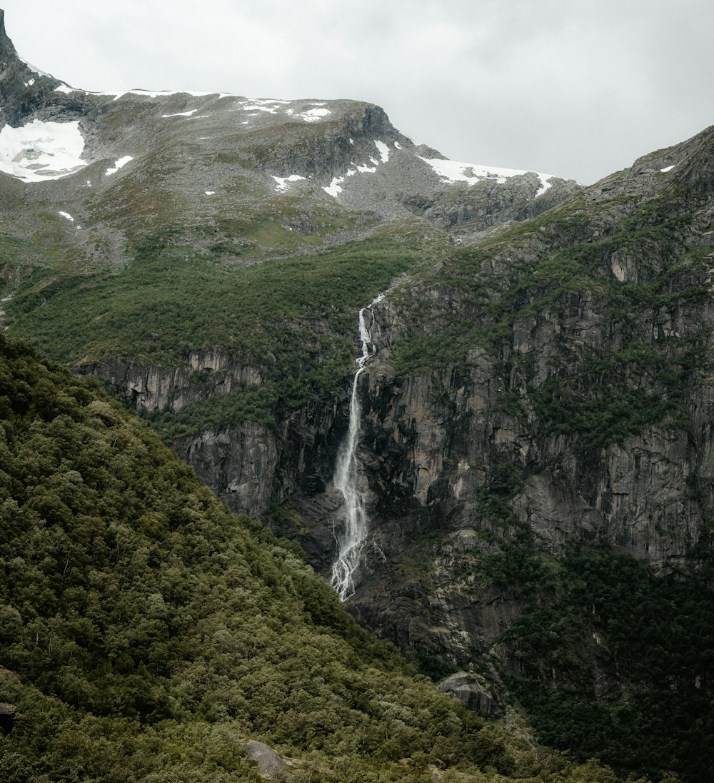 a waterfall in a mountain