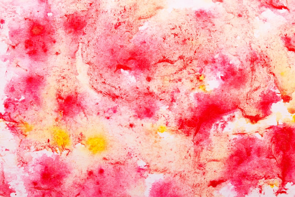 a close up of a pink and white substance