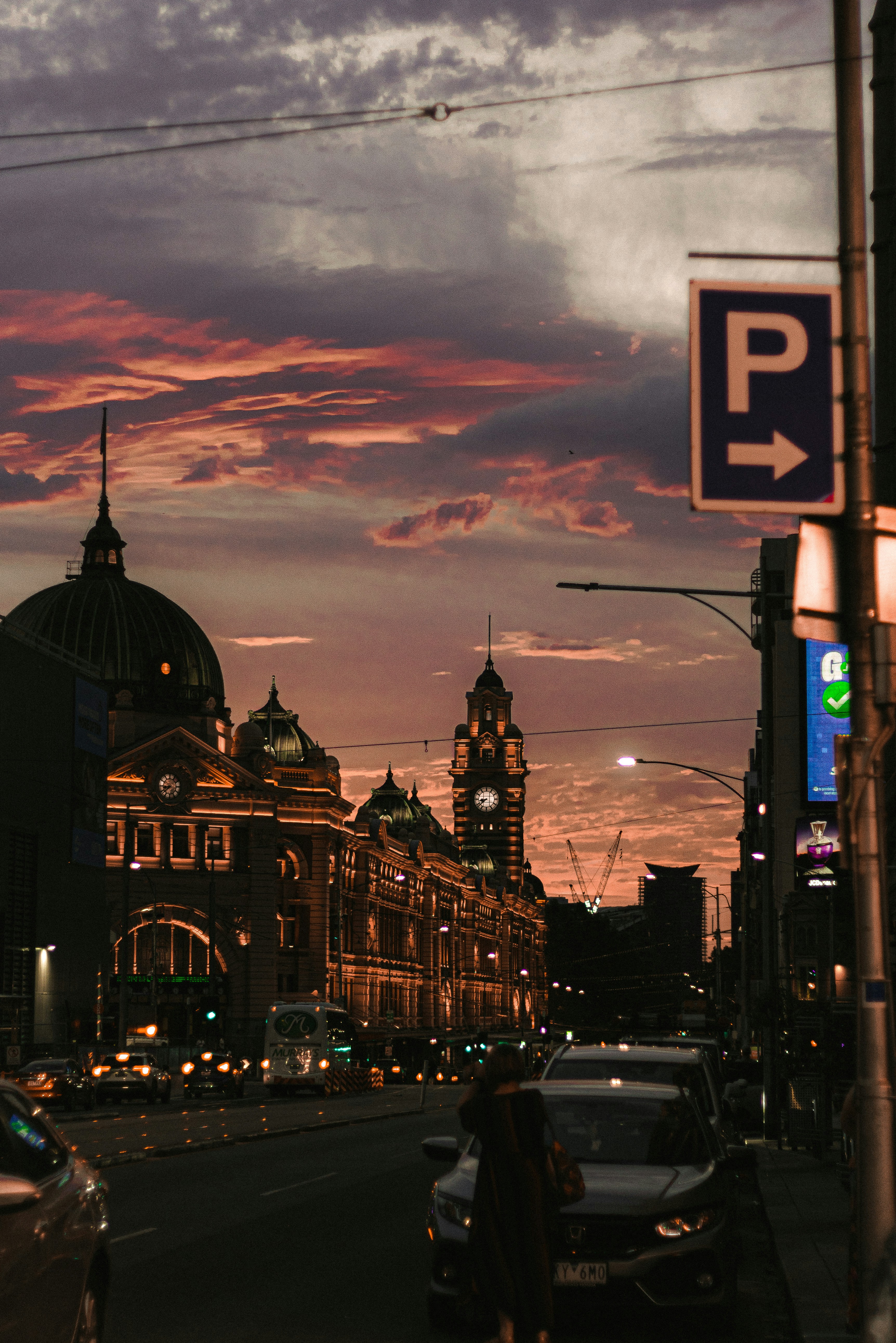 a city street with a clock tower