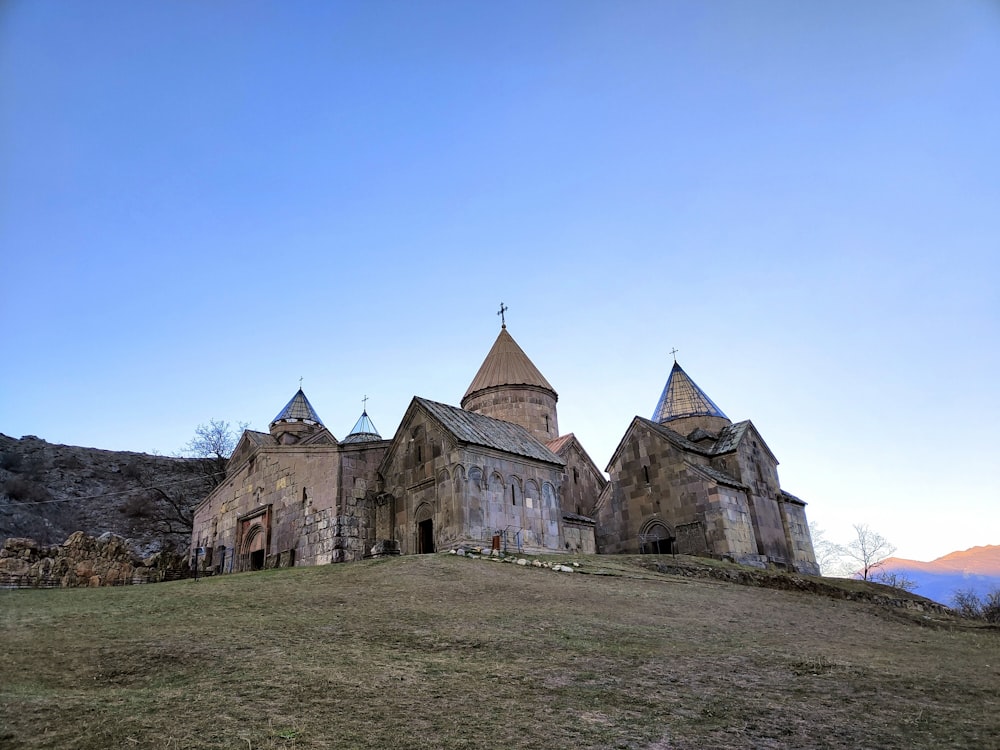 a stone building with steeples