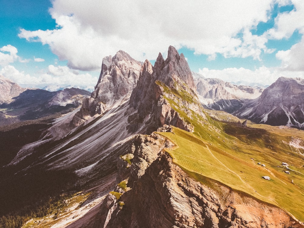 a rocky mountain with snow