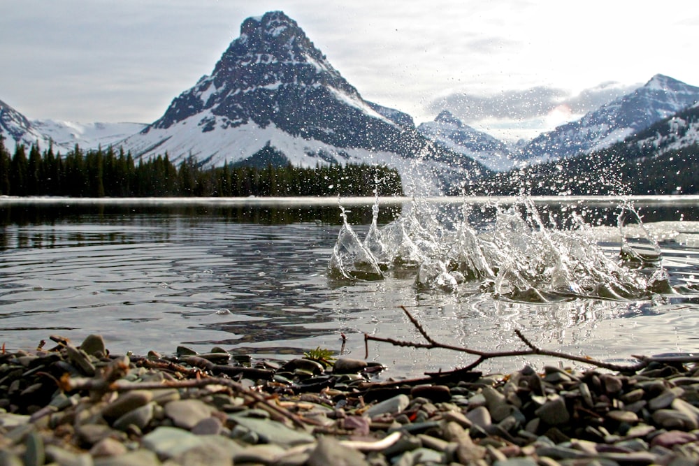 a lake with a mountain in the background