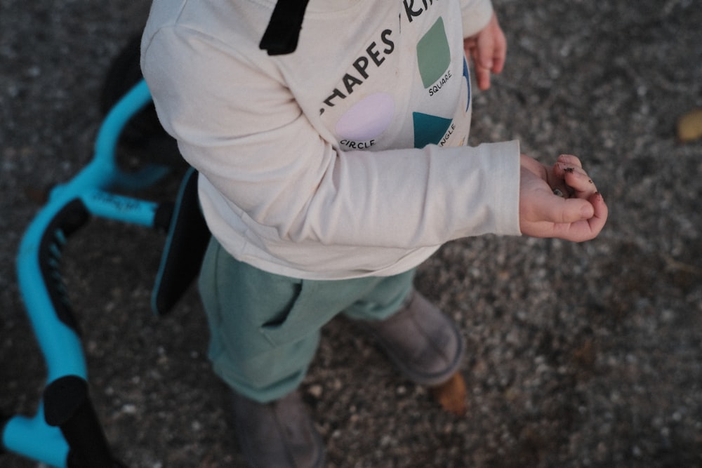 a person wearing a white shirt and shorts