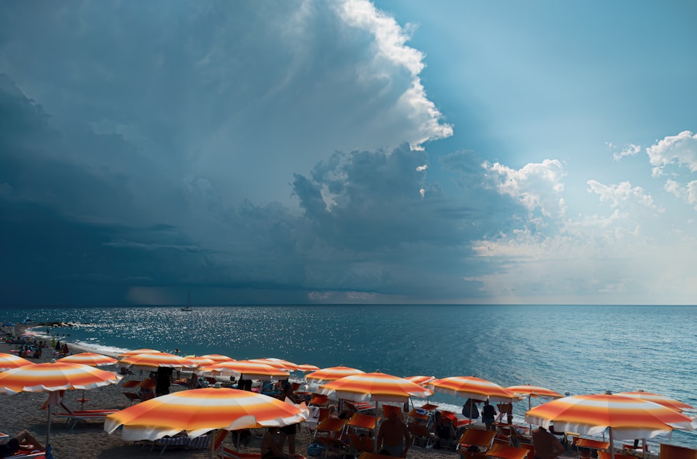 a beach with umbrellas