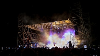 a stage with a crowd watching
