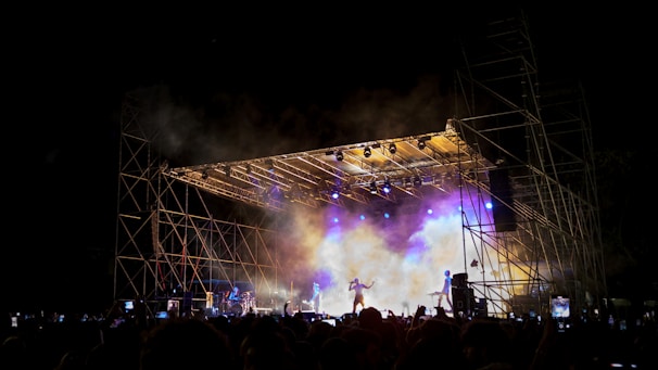 a stage with a crowd watching