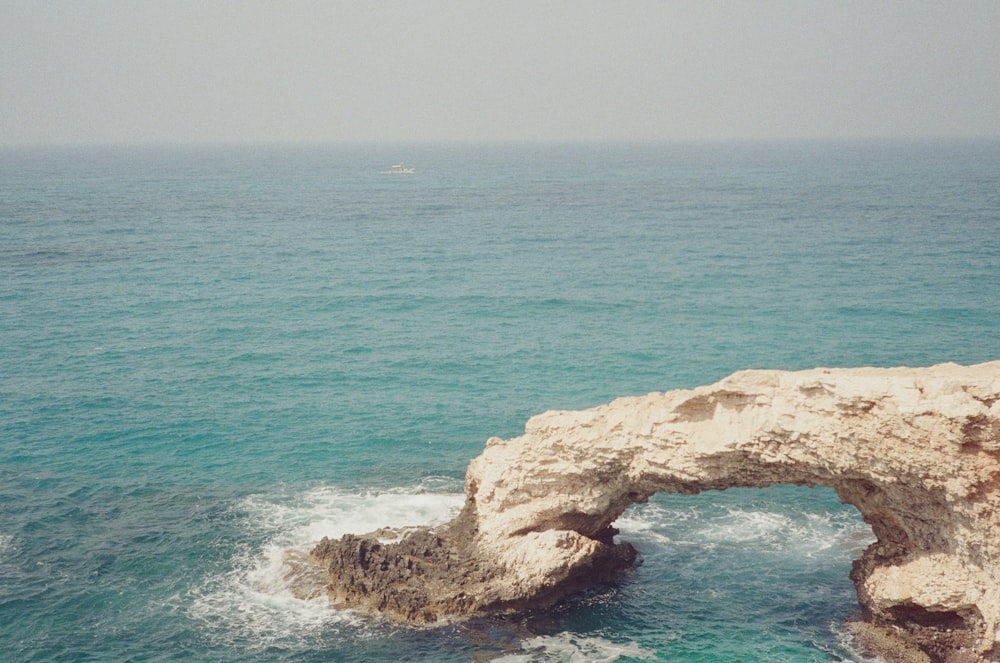 a rocky cliff overlooking the ocean