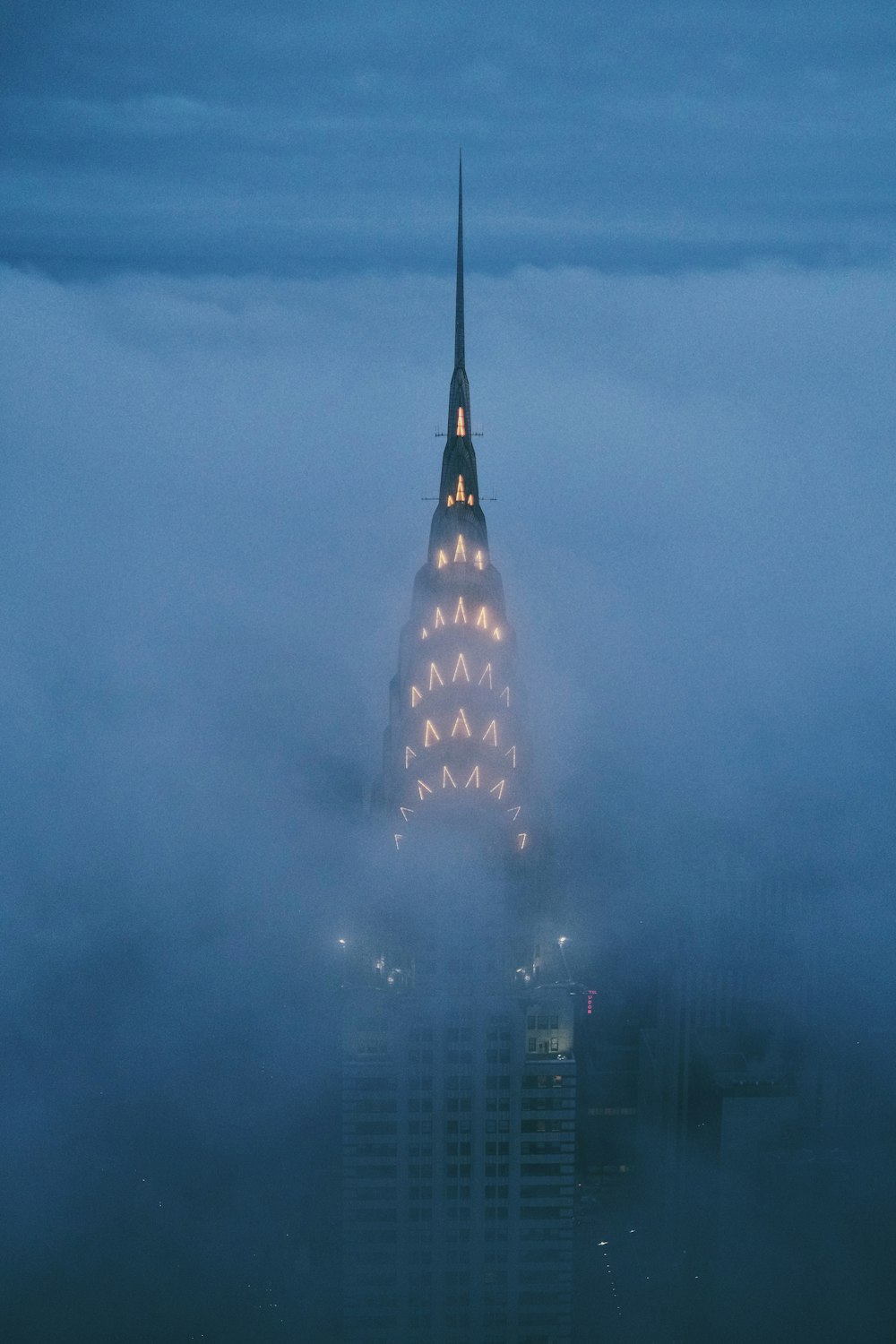 a tall building with lights at night