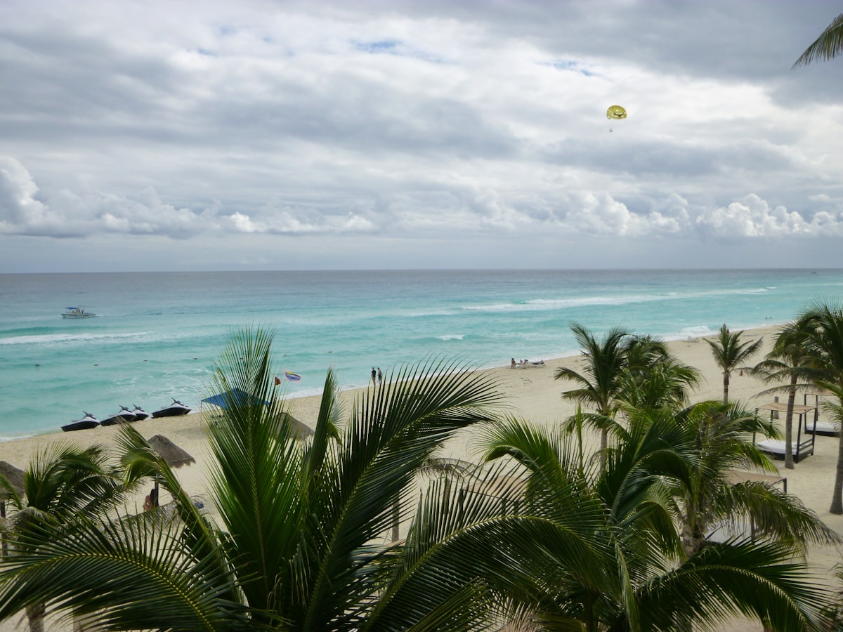 Zona Hotelera Sur Cancun — the Hotel Zone beach and resort towers along the Caribbean coast