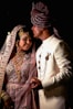 a man and woman in traditional indian attire