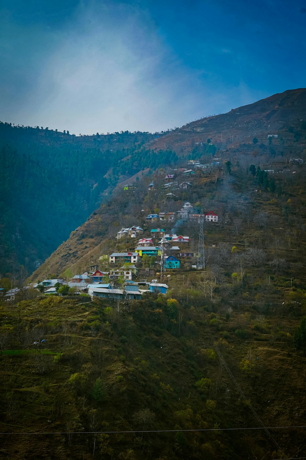 a town on a hill by the sea