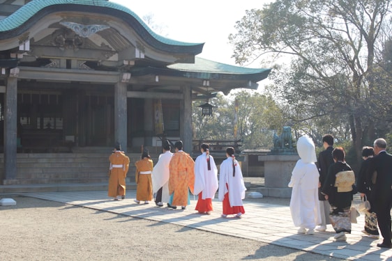 A welcoming training session with diverse participants learning Japanese culture and skills.