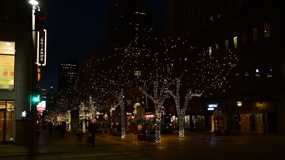 a street with trees with lights