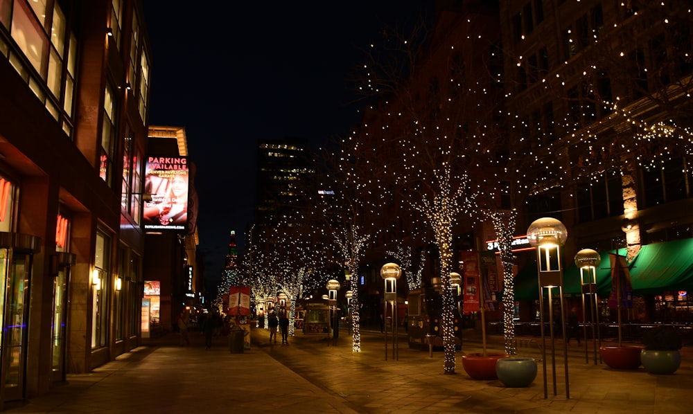 a street with trees and lights