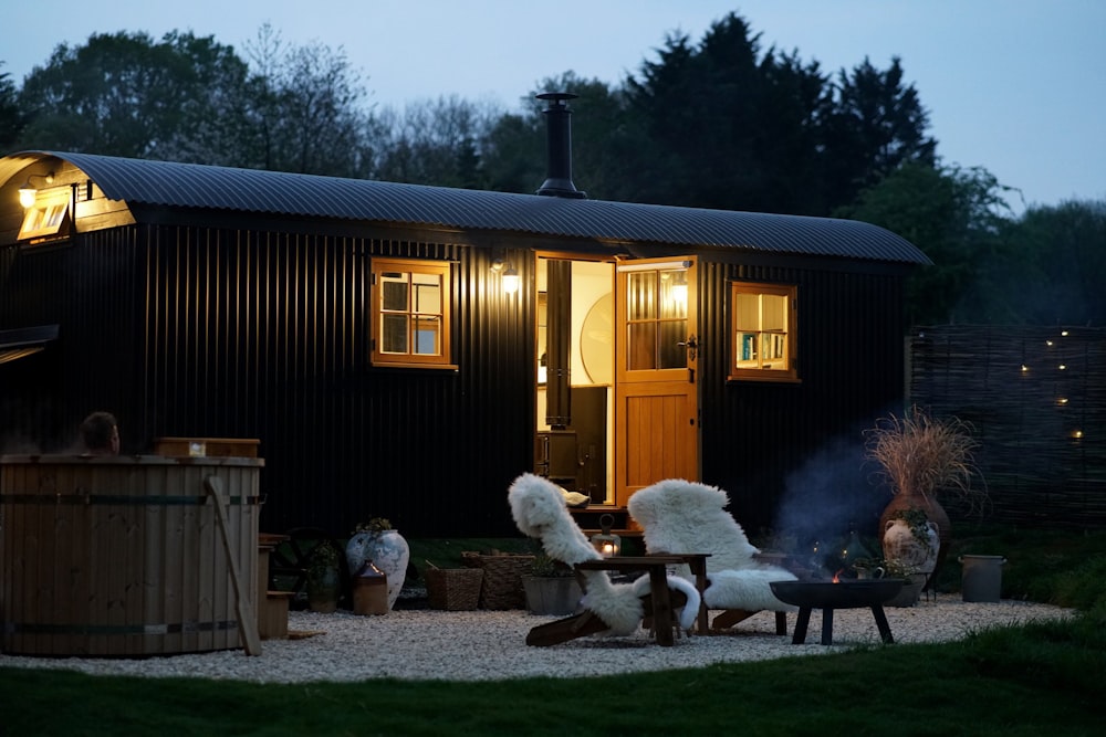 a house with a fire pit and a fire pit