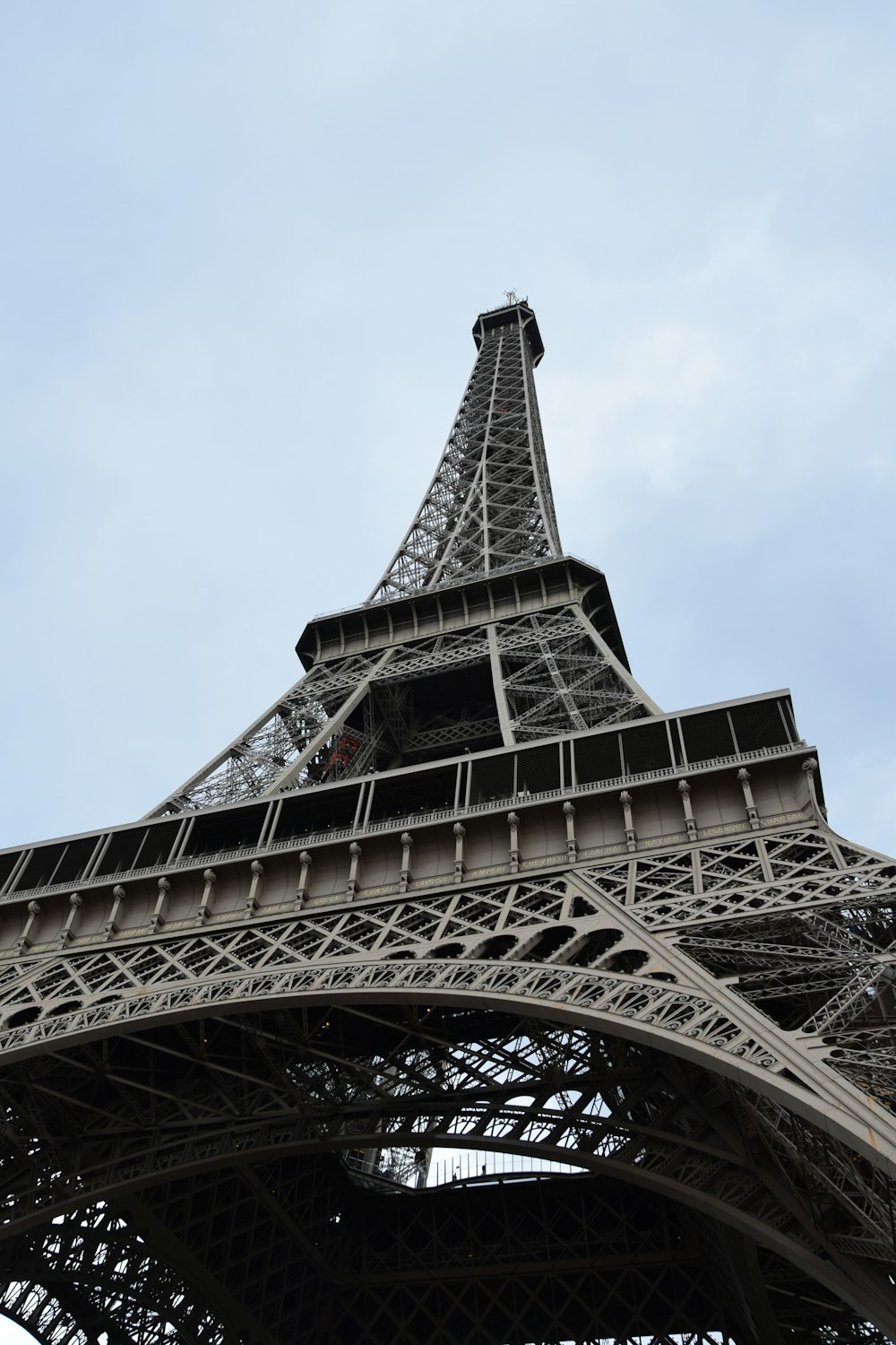 a close-up of the eiffel tower with Eiffel Tower in the background