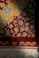 An elegant Turkish carpet featuring rich textures and colors.