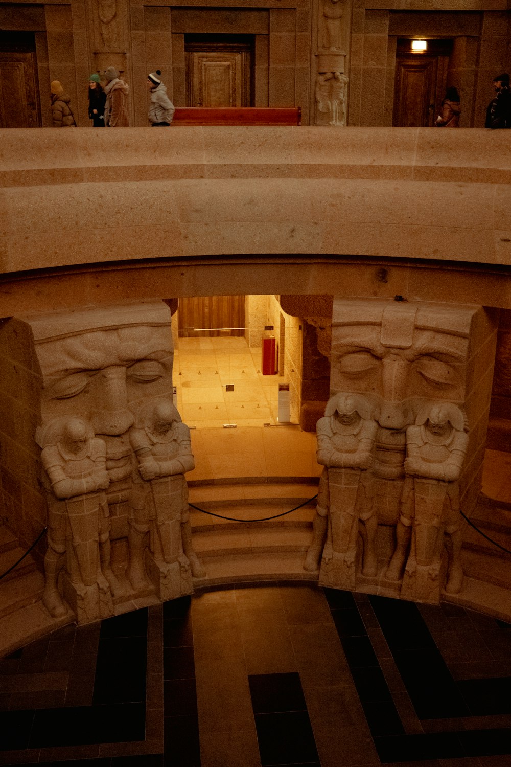a group of statues in a building