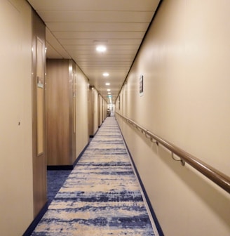 a long hallway with white walls