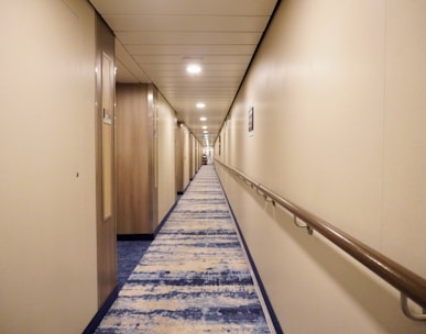 a long hallway with white walls